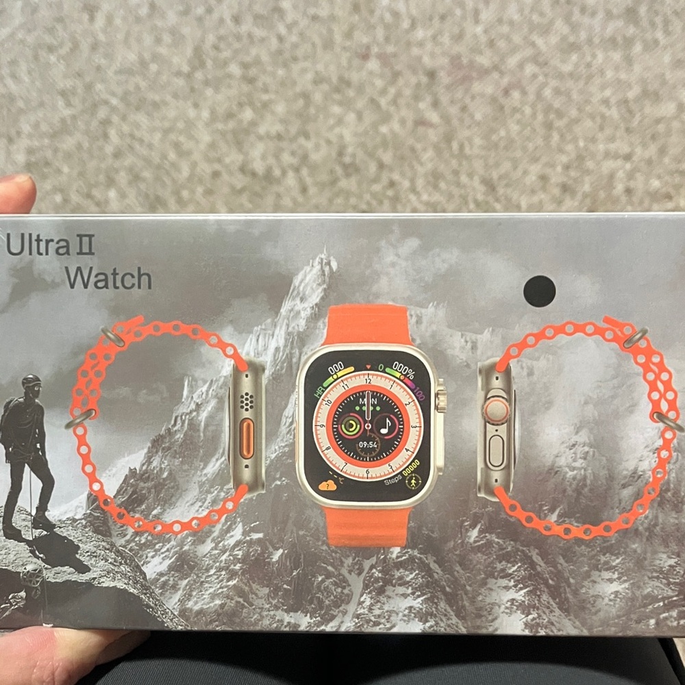 New in box- Orange Smartwatch with Interchangeable Bands